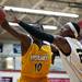 Ypsilanti junior Jaylen Johnson reaches for a loose ball in the game against Saginaw High on Tuesday, March 19. Daniel Brenner I AnnArbor.com